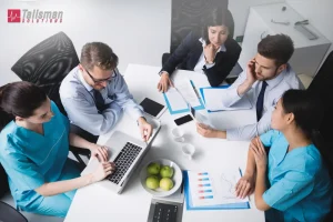 medical billing experts and healthcare professionals in a meeting